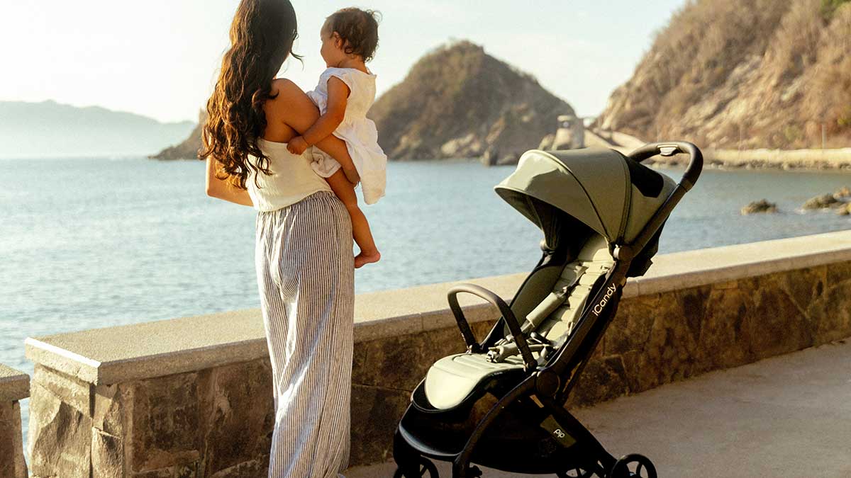 iCandy Pip Compact Stroller being used on holiday by the sea